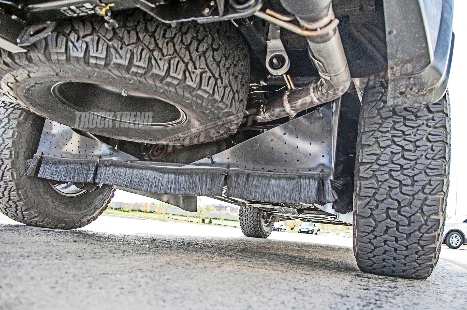 Ford Bronco Ford Testing New Suspension for Performance Trucks? 2021-ford-f-150-raptor-exterior-disguised-rear-suspension-02