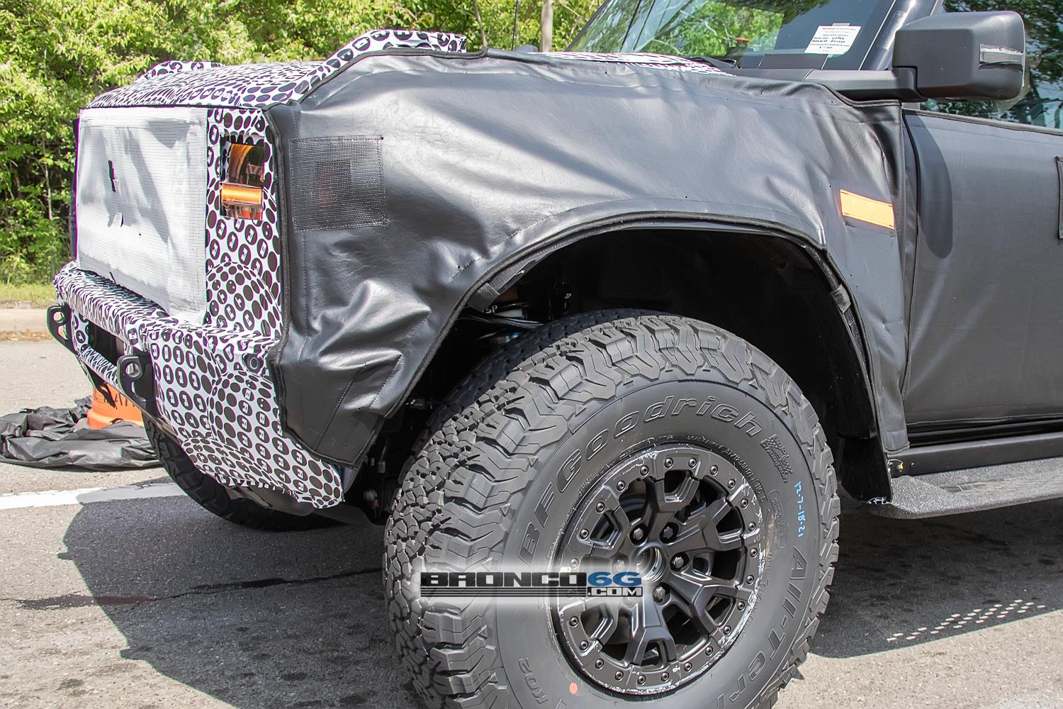 Ford Bronco Spied: Bronco Warthog Hints at FORD Grille and Other New Details warthog-bronco-ford-grille-marker-lights-running-boards-side-steps-bead-lock-37-inch-wheels-3