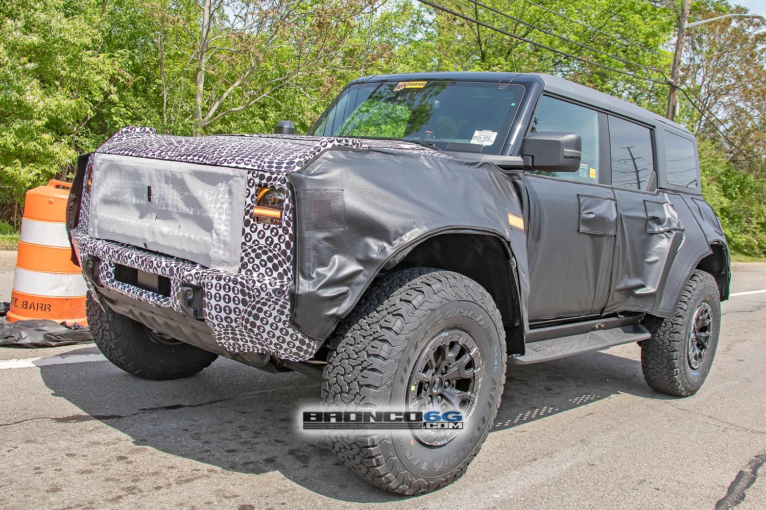 Ford Bronco Spied: Bronco Warthog Hints at FORD Grille and Other New Details warthog-bronco-ford-grille-marker-lights-running-boards-side-steps-bead-lock-37-inch-wheels-4