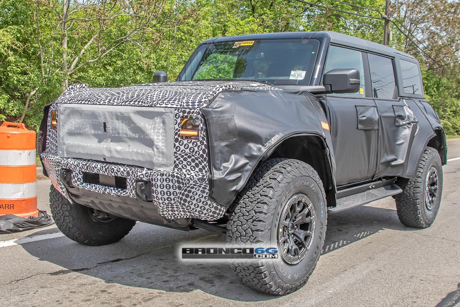 Ford Bronco Spied: Bronco Warthog Hints at FORD Grille and Other New Details warthog-bronco-ford-grille-marker-lights-running-boards-side-steps-bead-lock-37-inch-wheels-6