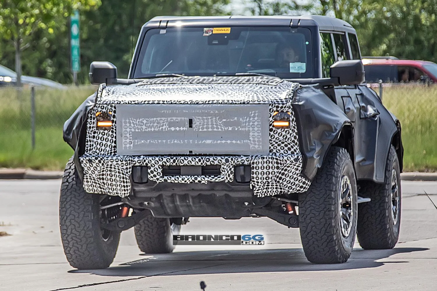 Ford Bronco Spied: Bronco Warthog Hints at FORD Grille and Other New Details warthog-bronco-ford-grille-marker-lights-running-boards-side-steps-bead-lock-37-inch-wheels-7