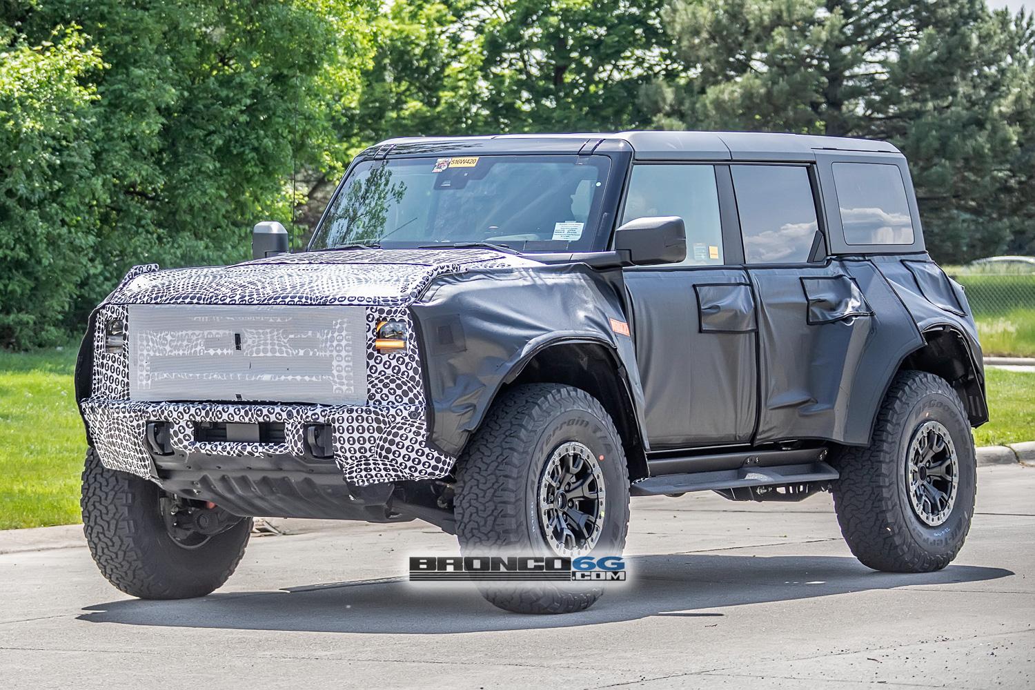 Ford Bronco Spied: Bronco Warthog Hints at FORD Grille and Other New Details warthog-bronco-ford-grille-marker-lights-running-boards-side-steps-bead-lock-37-inch-wheels-10
