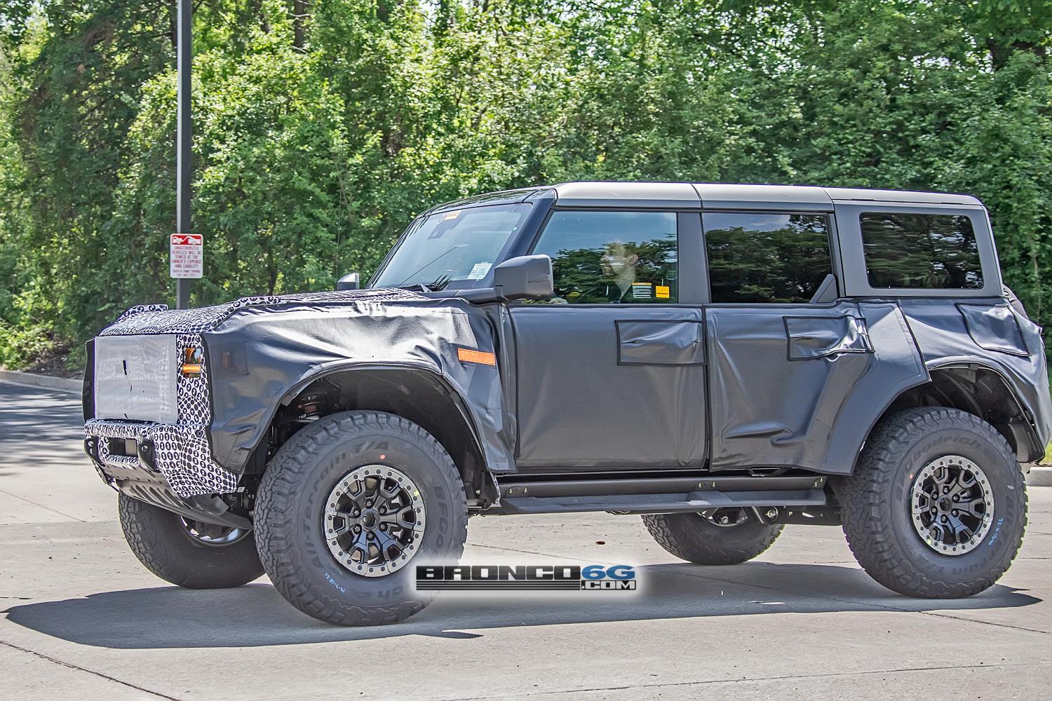 Ford Bronco Spied: Bronco Warthog Hints at FORD Grille and Other New Details warthog-bronco-ford-grille-marker-lights-running-boards-side-steps-bead-lock-37-inch-wheels-13
