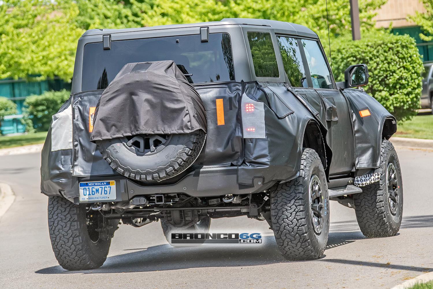 Ford Bronco Spied: Bronco Warthog Hints at FORD Grille and Other New Details warthog-bronco-ford-grille-marker-lights-running-boards-side-steps-bead-lock-37-inch-wheels-19