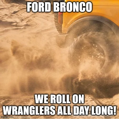 Ford Bronco Pics: Black Bronco Wildtrak (w/ Sasquatch Package) in Public Parking Lot Bronco on Wranglers
