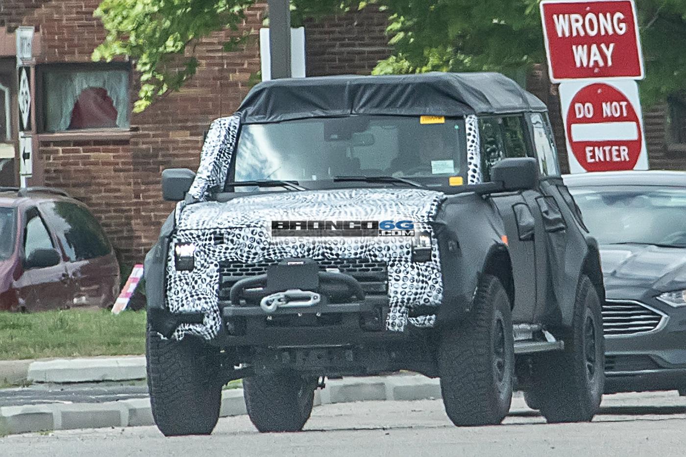 Ford Bronco Spied: Bronco Overland Sasquatch Prototype Caught Testing Winch, Snorkel and Roof Accessories bronco-overland-sasquatch-prototype-testing-winch-snorkel-cargo-tent-1