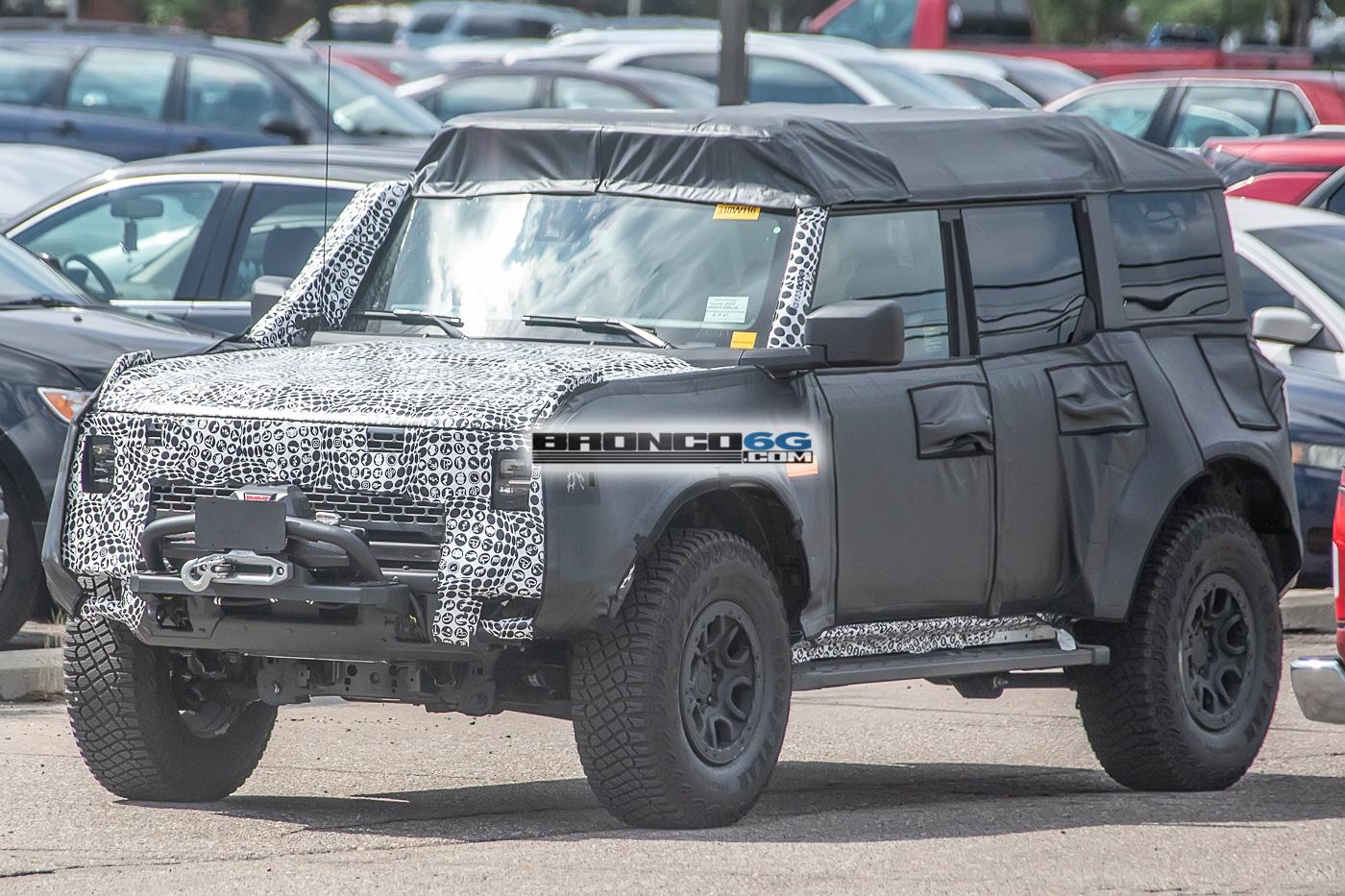 Ford Bronco Spied: Bronco Overland Sasquatch Prototype Caught Testing Winch, Snorkel and Roof Accessories bronco-overland-sasquatch-prototype-testing-winch-snorkel-cargo-tent-2