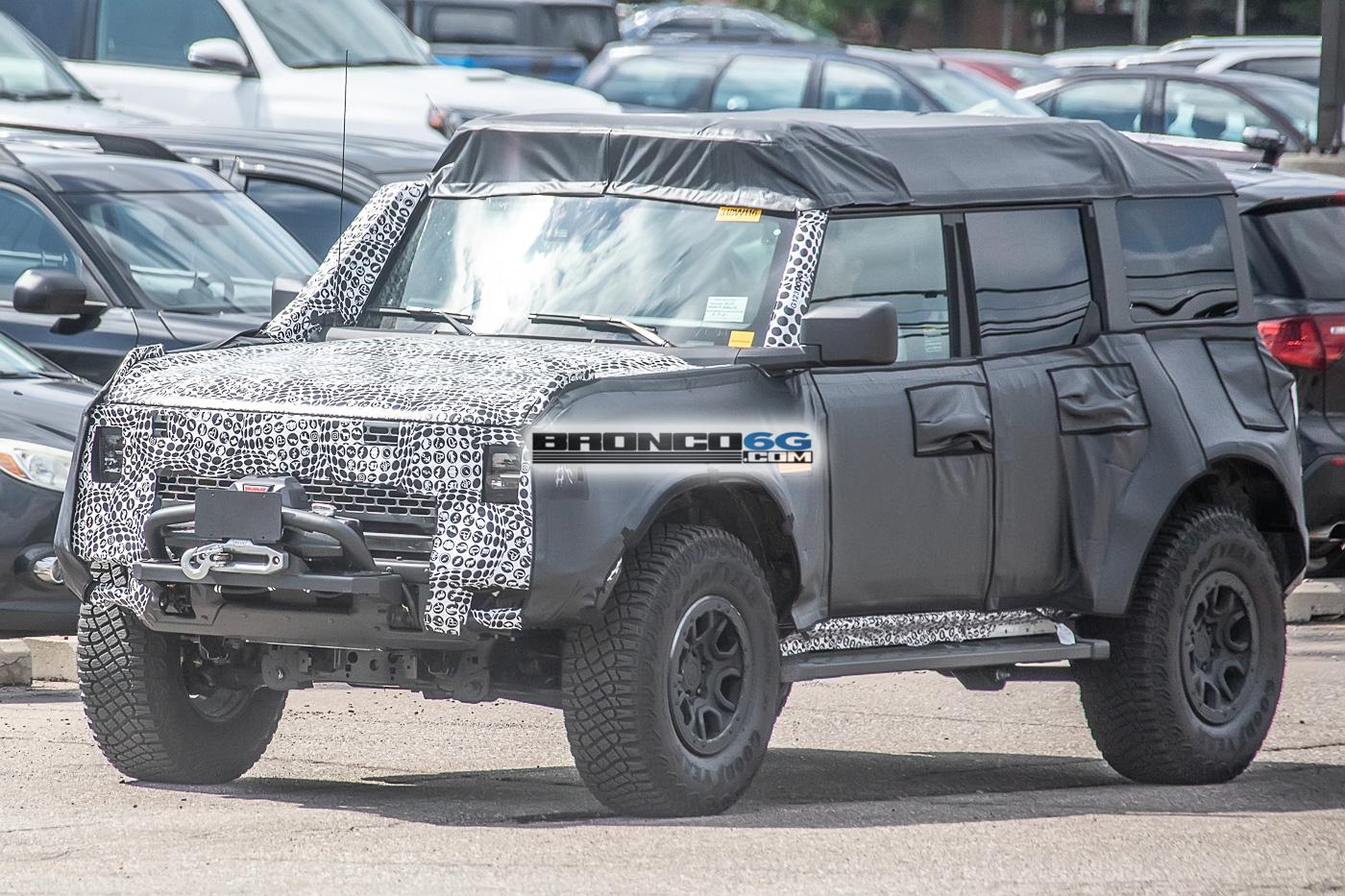 Ford Bronco Spied: Bronco Overland Sasquatch Prototype Caught Testing Winch, Snorkel and Roof Accessories bronco-overland-sasquatch-prototype-testing-winch-snorkel-cargo-tent-3