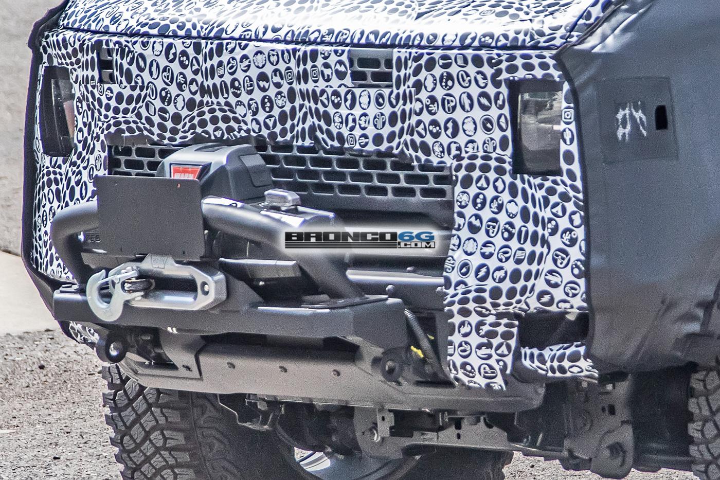 Ford Bronco Spied: Bronco Overland Sasquatch Prototype Caught Testing Winch, Snorkel and Roof Accessories bronco-overland-sasquatch-prototype-testing-winch-snorkel-cargo-tent-7