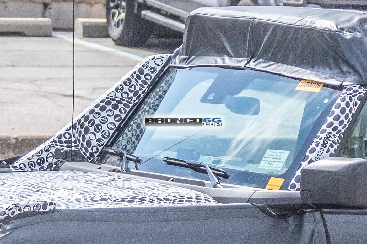 Ford Bronco Spied: Bronco Overland Sasquatch Prototype Caught Testing Winch, Snorkel and Roof Accessories bronco-overland-sasquatch-prototype-testing-winch-snorkel-cargo-tent-9