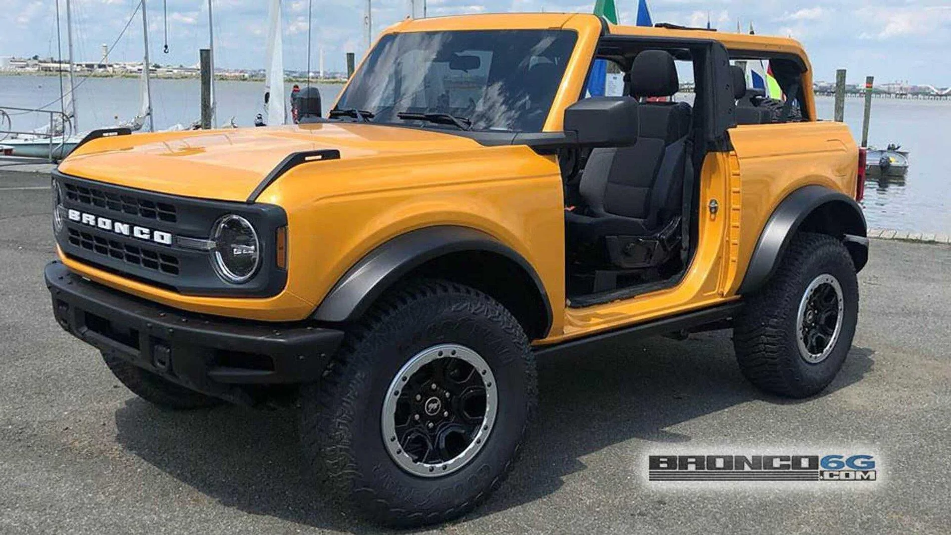 2021-ford-bronco-2-door-base-with-the-sasquatch-package-and-cyber-orange-paint.webp