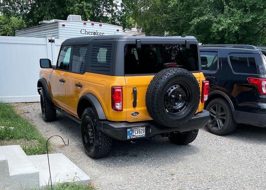 Ford Bronco CYBER ORANGE Bronco Club Cyber Orange Bronco 4-Door Black Steel Wheels Steelies