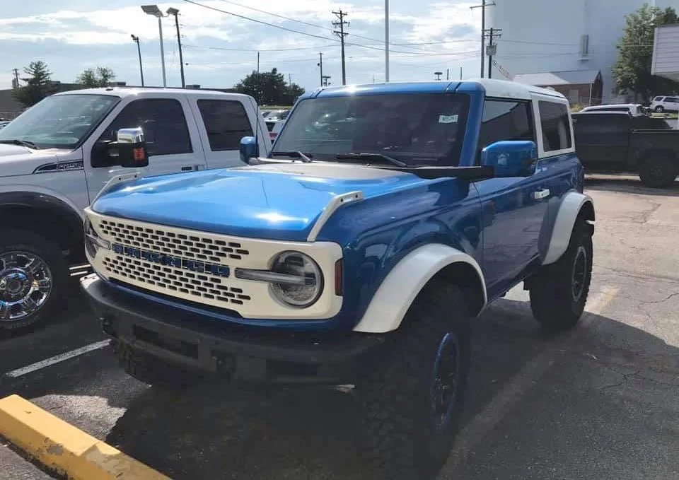 Ford Bronco A Velocity Blue Bronco Goes Retro With White Roof + White Fender Flares 2021 Bronco painted white roof white fender flares
