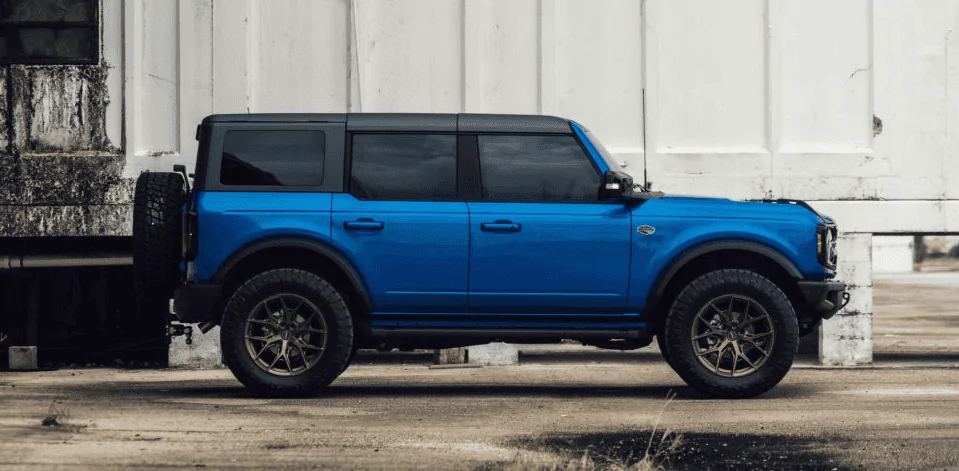 Ford Bronco 20's Vossen Wheels on Velocity Blue Wildtrak Bronco 1629310573959