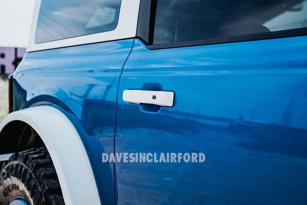 Ford Bronco A Velocity Blue Bronco Goes Retro With White Roof + White Fender Flares 88d1b9a1-7fb8-42f3-ad78-2a8614fee3c5-jpeg