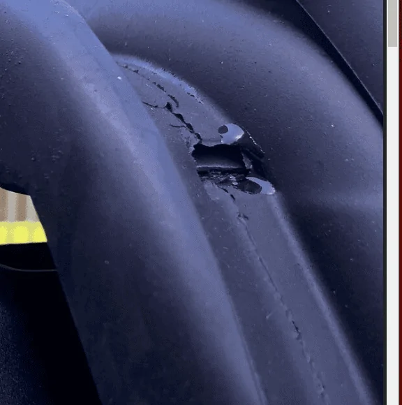 Ford Bronco MIC top installed incorrectly by factory (front bracket mounted on top screw rather than through it) 1629740781590