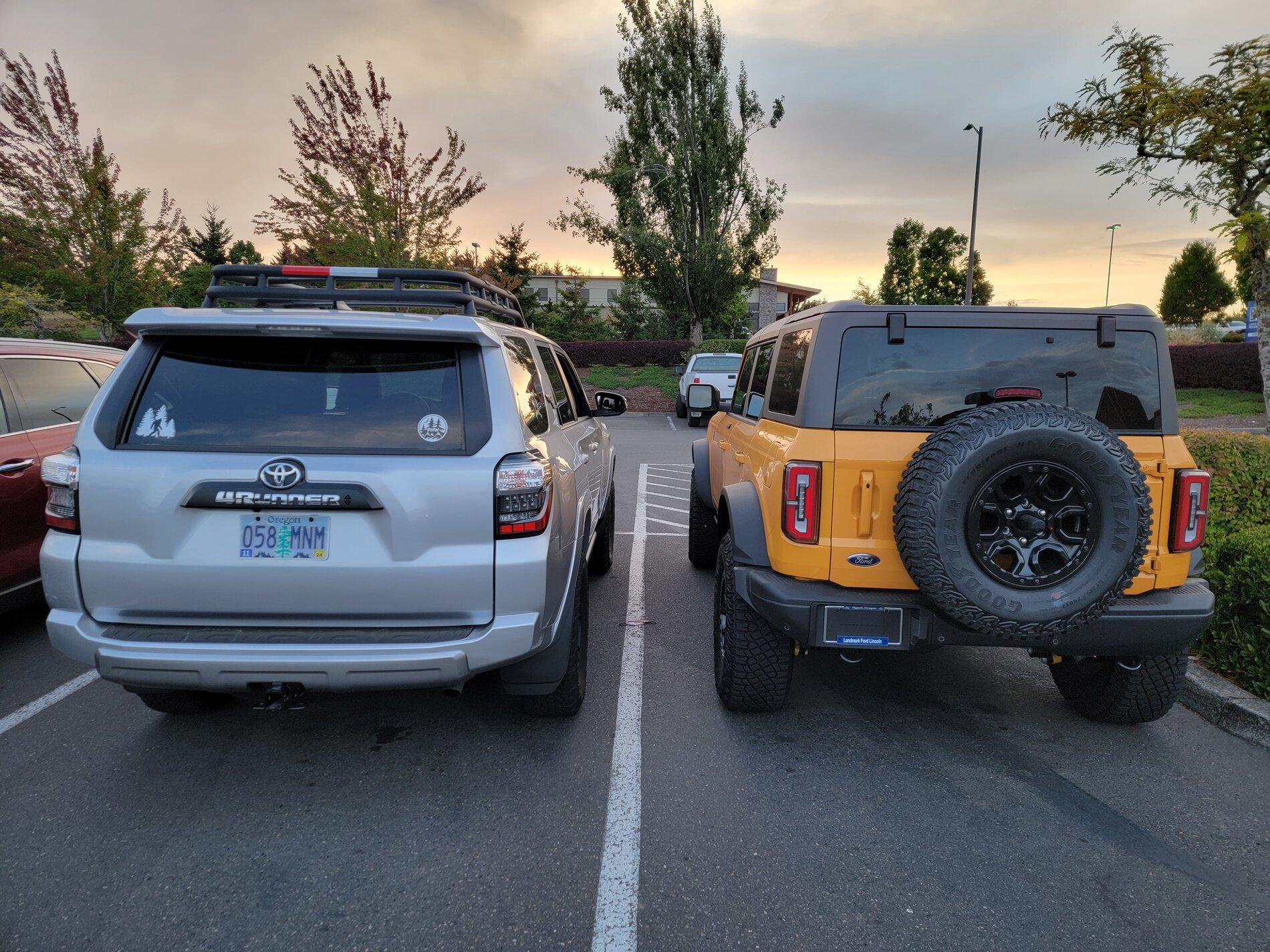 Ford Bronco Cyber Orange First Edition Bronco next to my 4Runner 20210909_192023