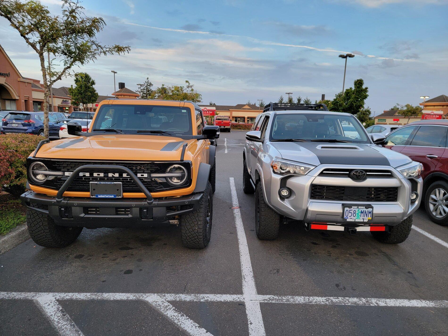 Ford Bronco Cyber Orange First Edition Bronco next to my 4Runner 20210909_191907
