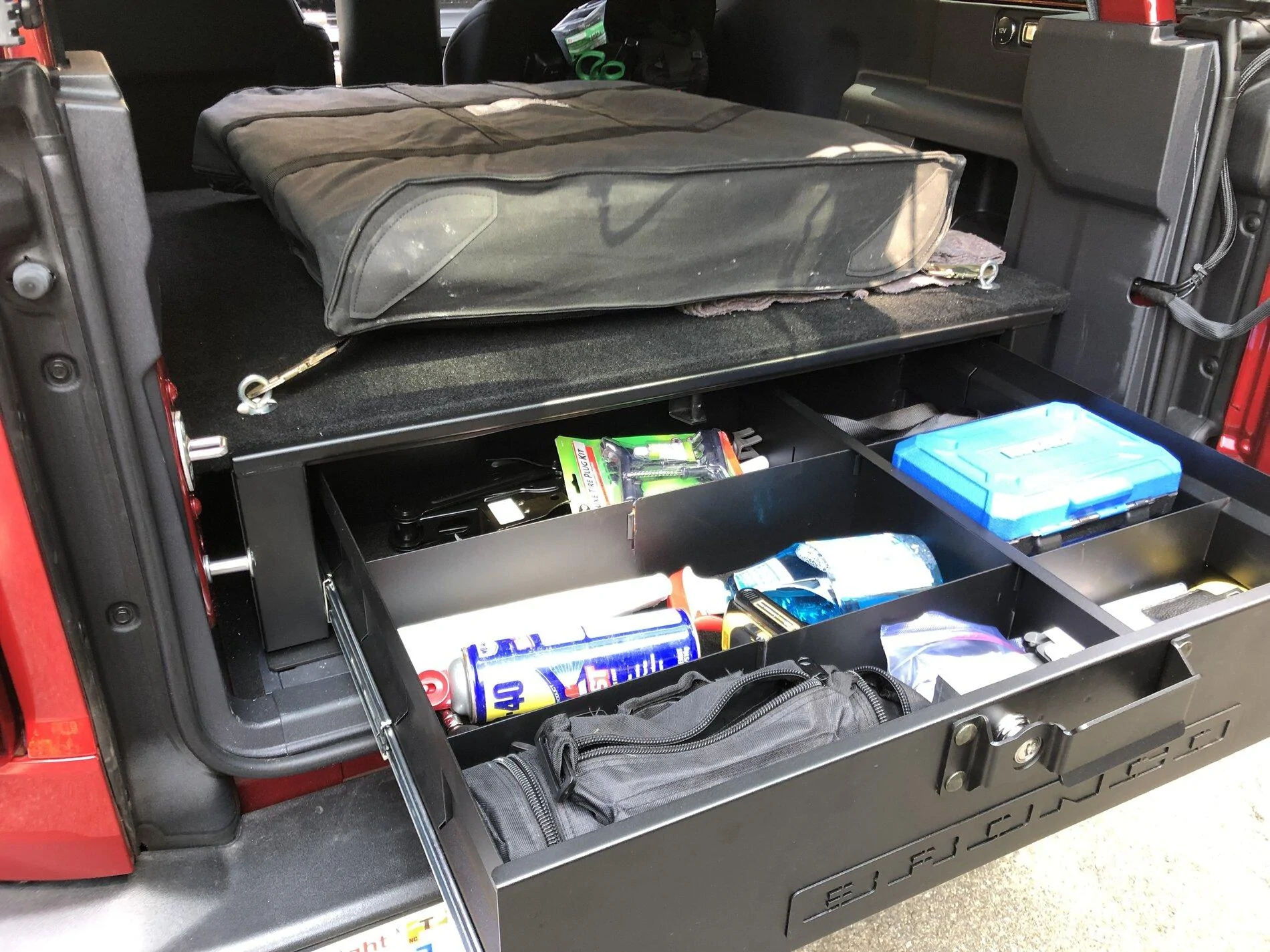 Ford Bronco Ford cargo security drawer installed in a 2-door Bronco with rear seat delete 395CEE7C-64B2-49E3-A6F6-BDD001C6DE9F