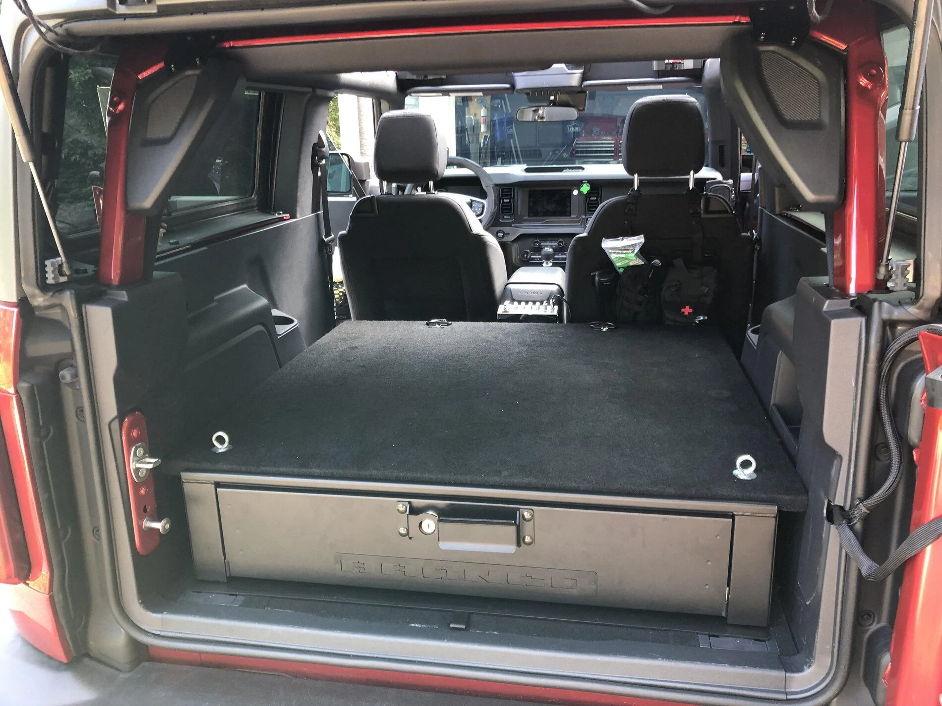 Ford Bronco Ford cargo security drawer installed in a 2-door Bronco with rear seat delete 2168C3BF-C0E0-485F-B546-15C8FFCD10A4