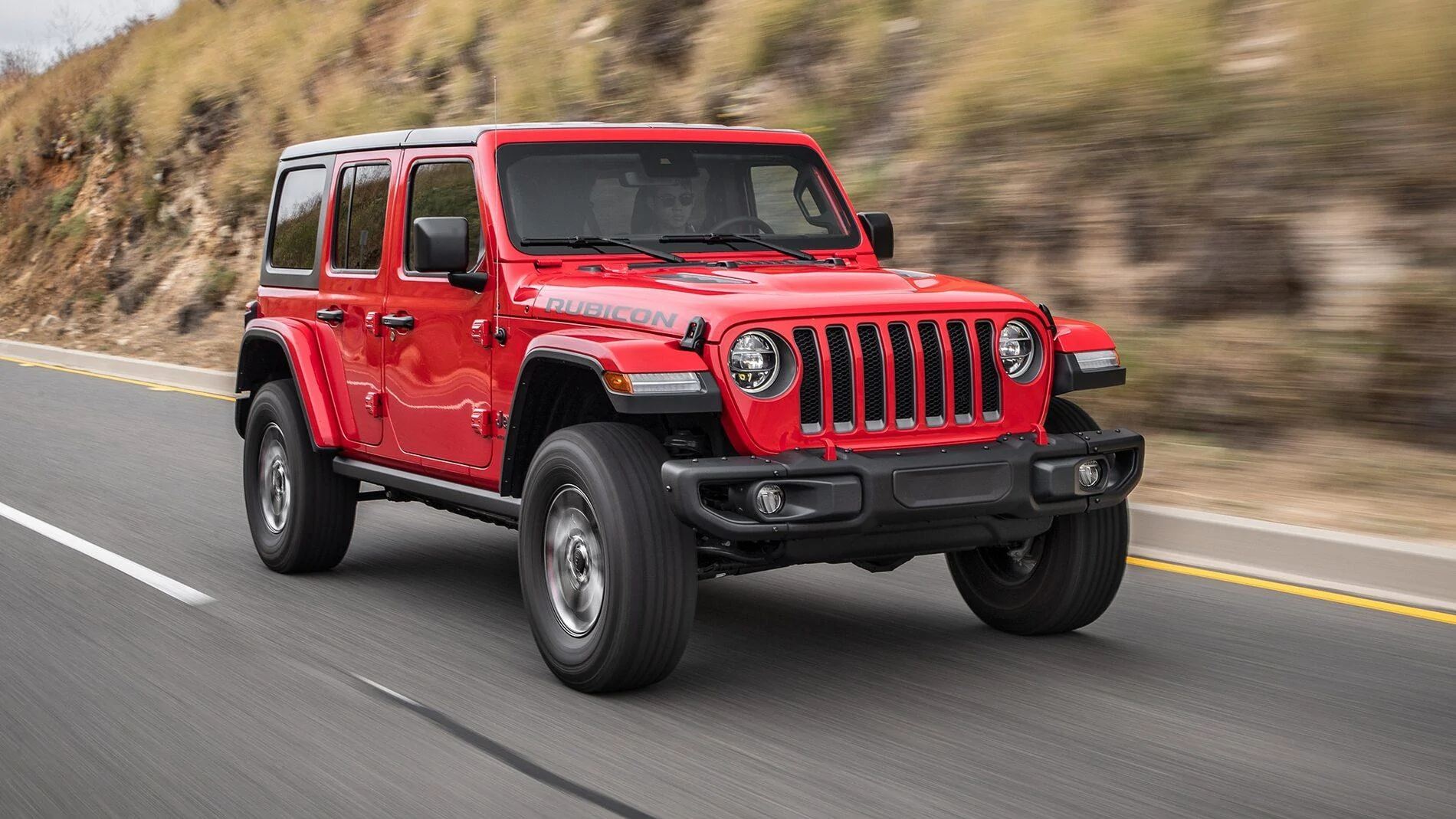 nlimited-Rubicon-front-three-quarter-in-motion-1-1.jpg