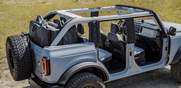 Ford Bronco Adding rear sub without affecting on board door storage? 1638393060300
