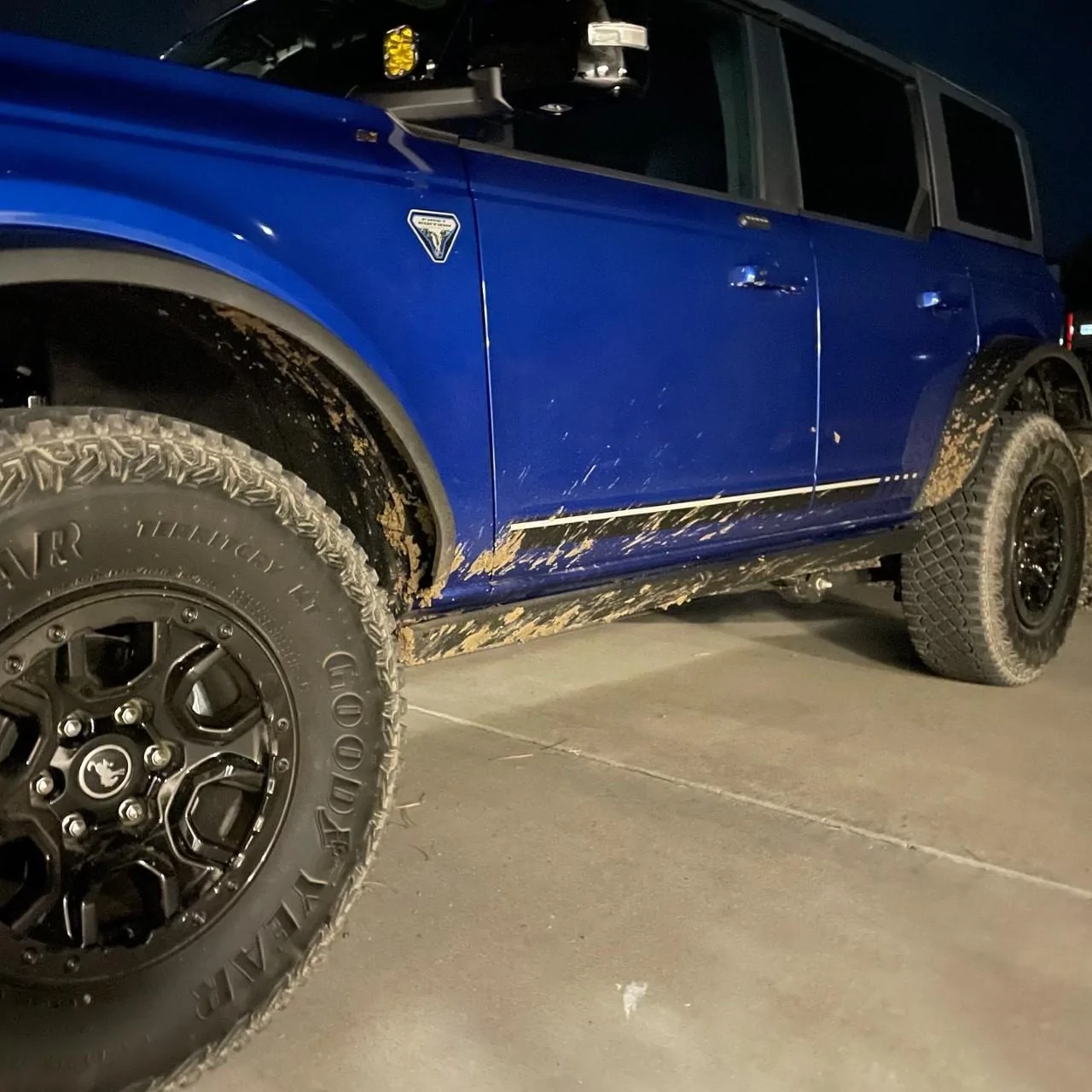 Ford Bronco Lightning Blue First Edition on 37's, 17" Dirtylife beadlocks wheels, King Shocks Baja Designs lights HE3