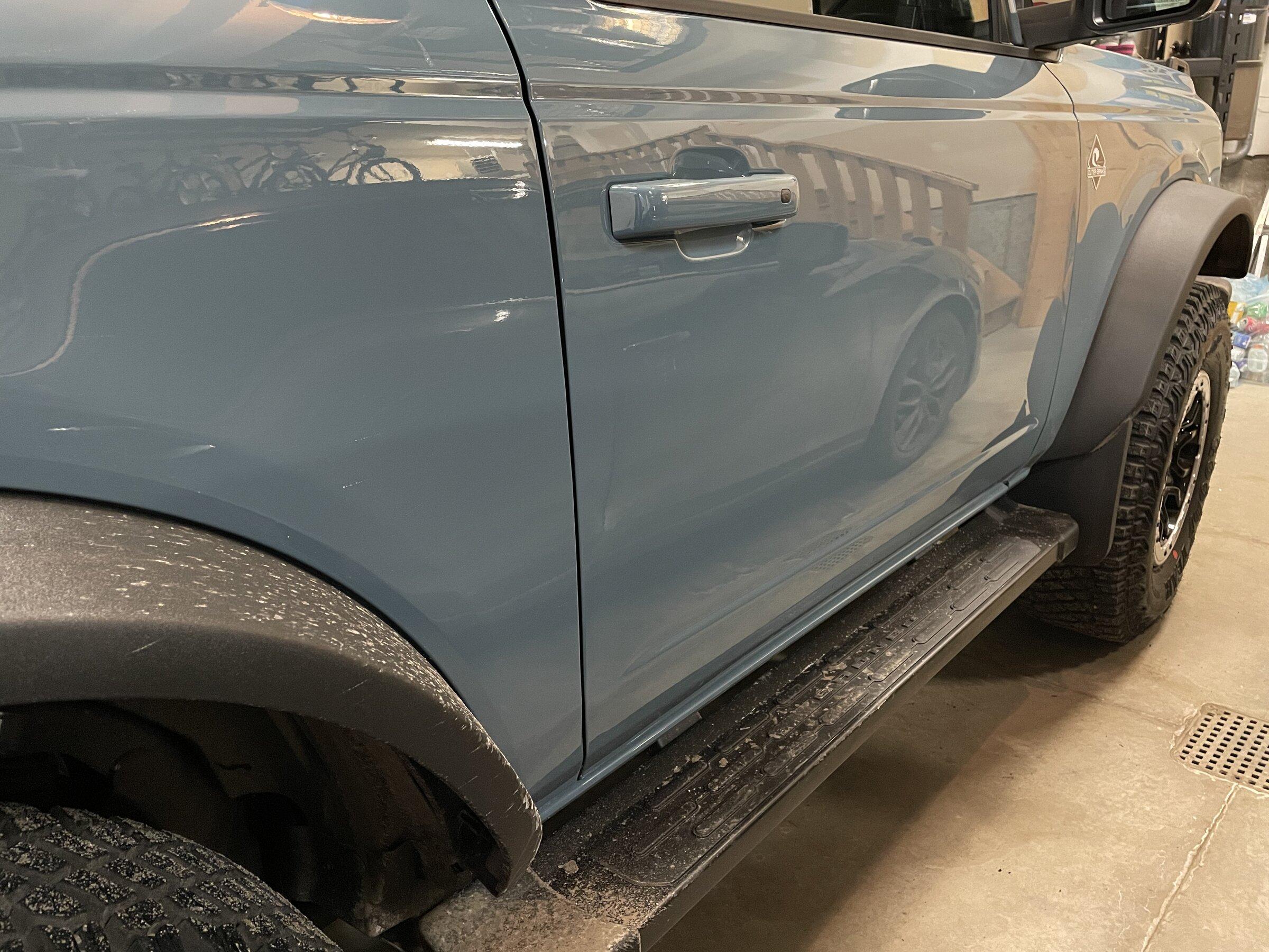 Ford Bronco Ford OEM Mud Flaps / Splash Guards trimmed to fit OBX Sasquatch with side steps 1D475551-5C3A-44B2-8C8B-B6AC9FEC0C7D