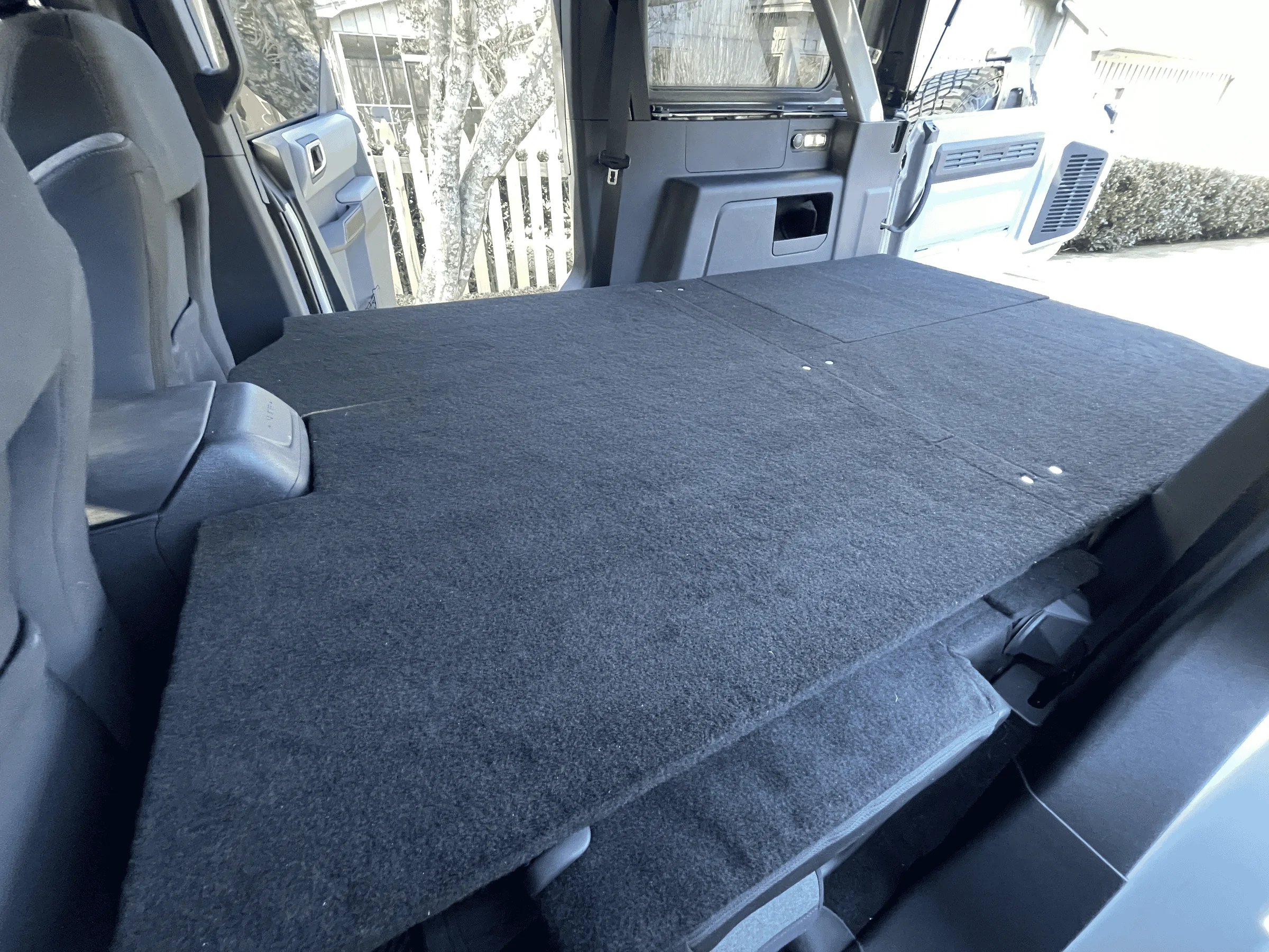 Ford Bronco 💤 Sleeping deck build in 4-door Bronco with photos, plans, and recommendations for a mattress and bedding setup. tempimagesk2wir-png