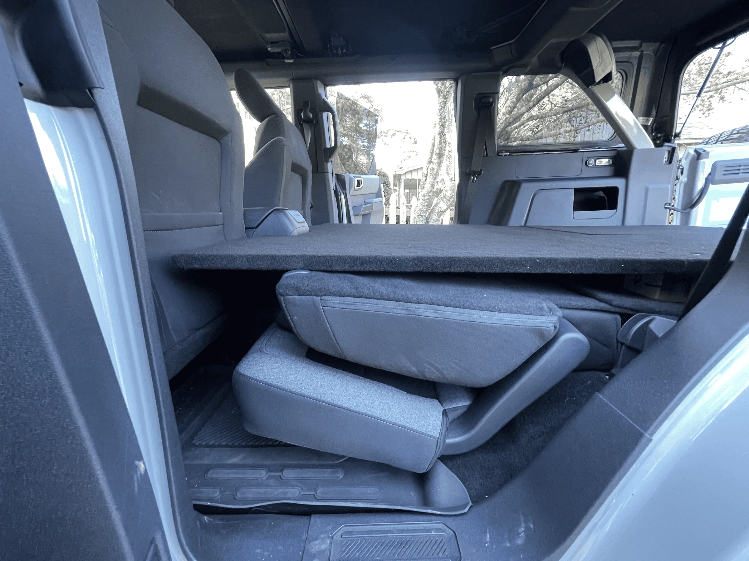Ford Bronco 💤 Sleeping deck build in 4-door Bronco with photos, plans, and recommendations for a mattress and bedding setup. tempimagehq8hcs-png