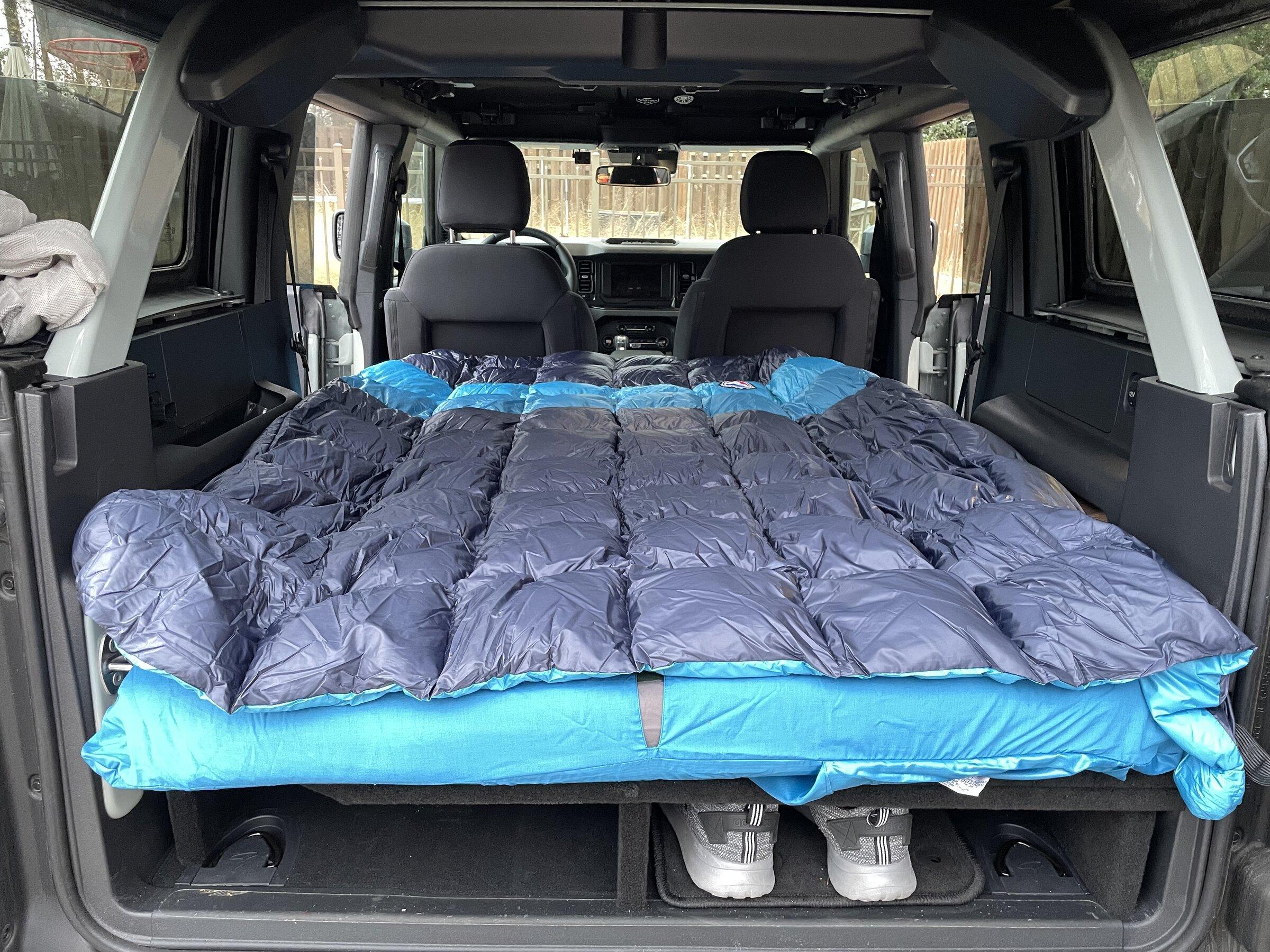 Ford Bronco 💤 Sleeping deck build in 4-door Bronco with photos, plans, and recommendations for a mattress and bedding setup. 75e9b8e8-a8e5-4a09-ba93-4b87c9727eba-jpe
