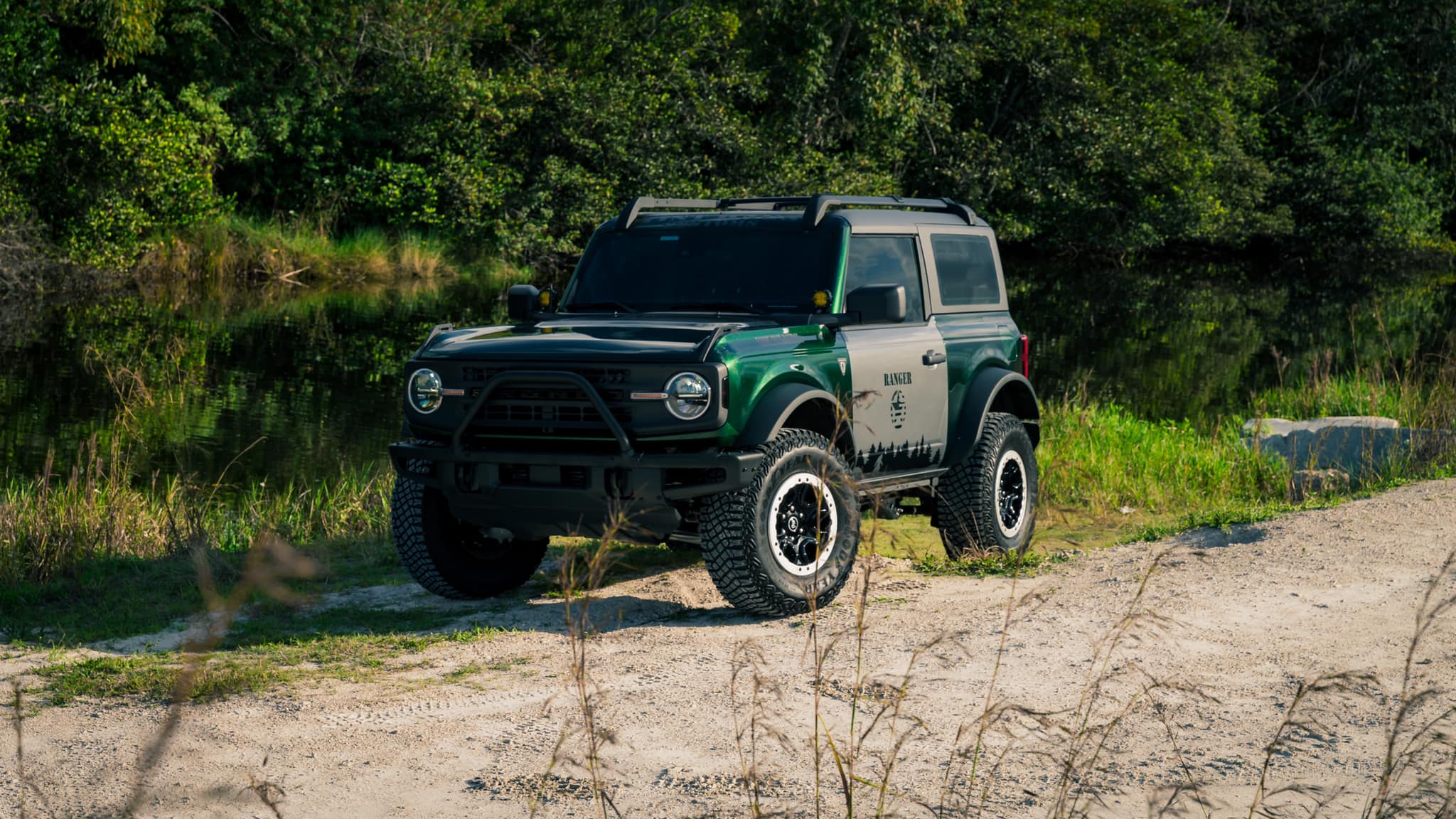 Ford Bronco "Sasquatch Patrol" Basesquatch in Gloss Metallic Racing Green wrap park ranger theme 271661457_385239050065408_4761287719694280807_n