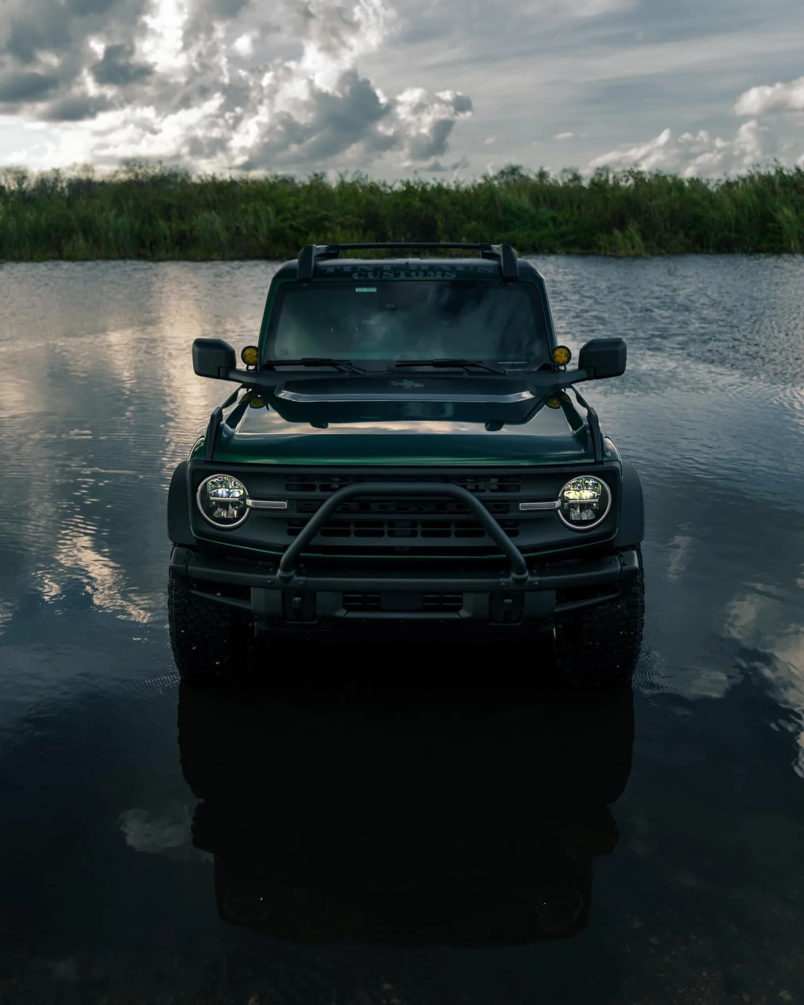 Ford Bronco "Sasquatch Patrol" Basesquatch in Gloss Metallic Racing Green wrap park ranger theme 271700850_385239133398733_6213148622024094671_n