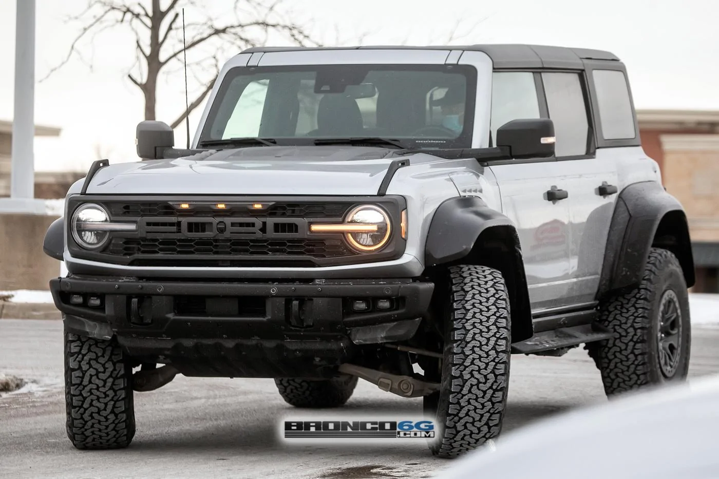 Ford Bronco 📷 Bronco Raptor Spied in Code Orange & Iconic Silver w/ New Interior Accents 2023-bronco-raptor-iconic-silver-spied-1