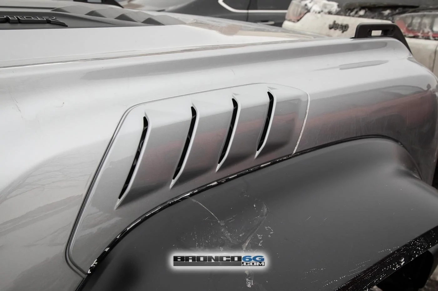 Ford Bronco 📷 Bronco Raptor Spied in Code Orange & Iconic Silver w/ New Interior Accents 2023-bronco-raptor-iconic-silver-spied-17