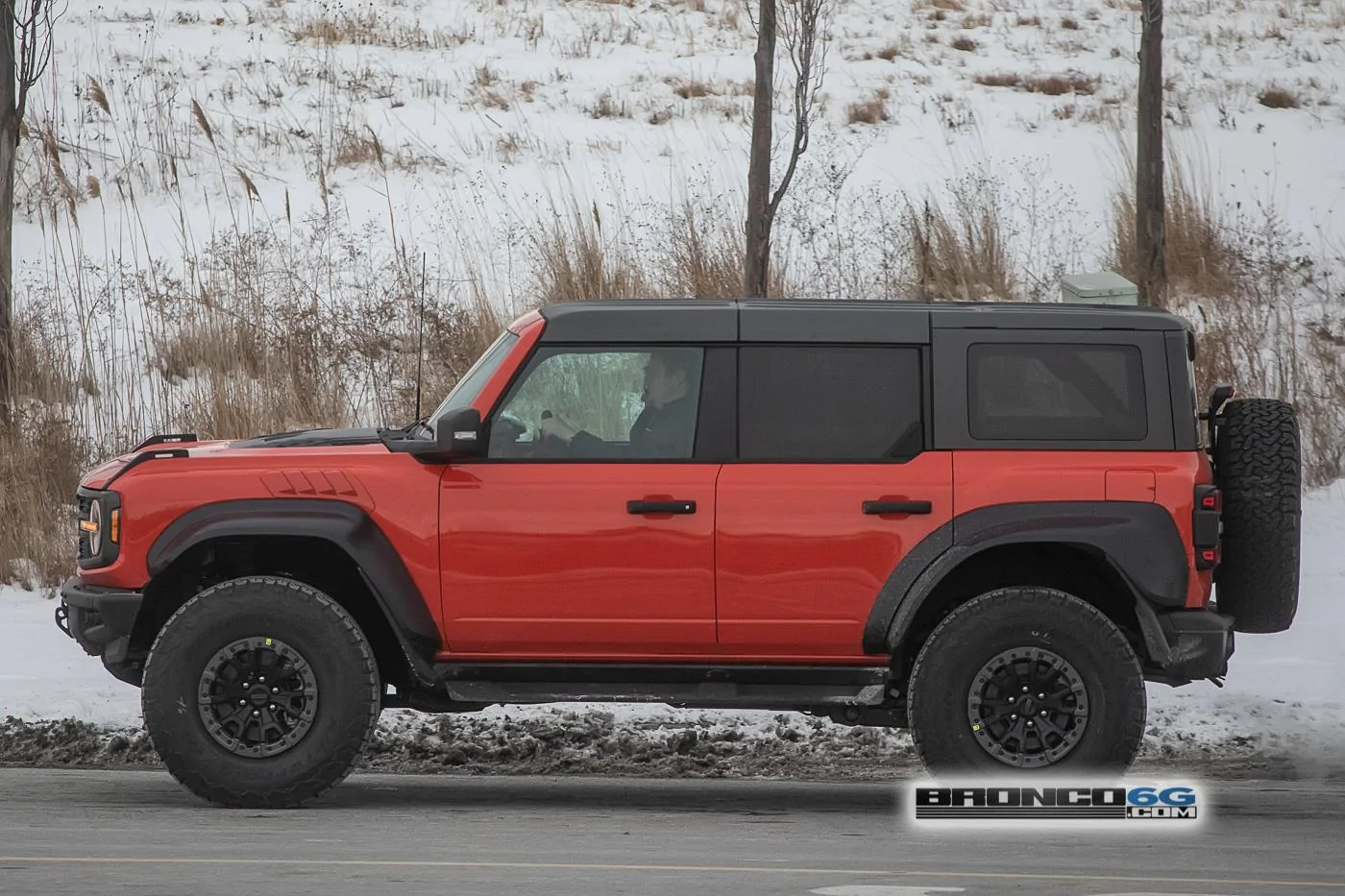 Ford Bronco 📷 Bronco Raptor Spied in Code Orange & Iconic Silver w/ New Interior Accents 2023-bronco-raptor-code-orange-spied-22
