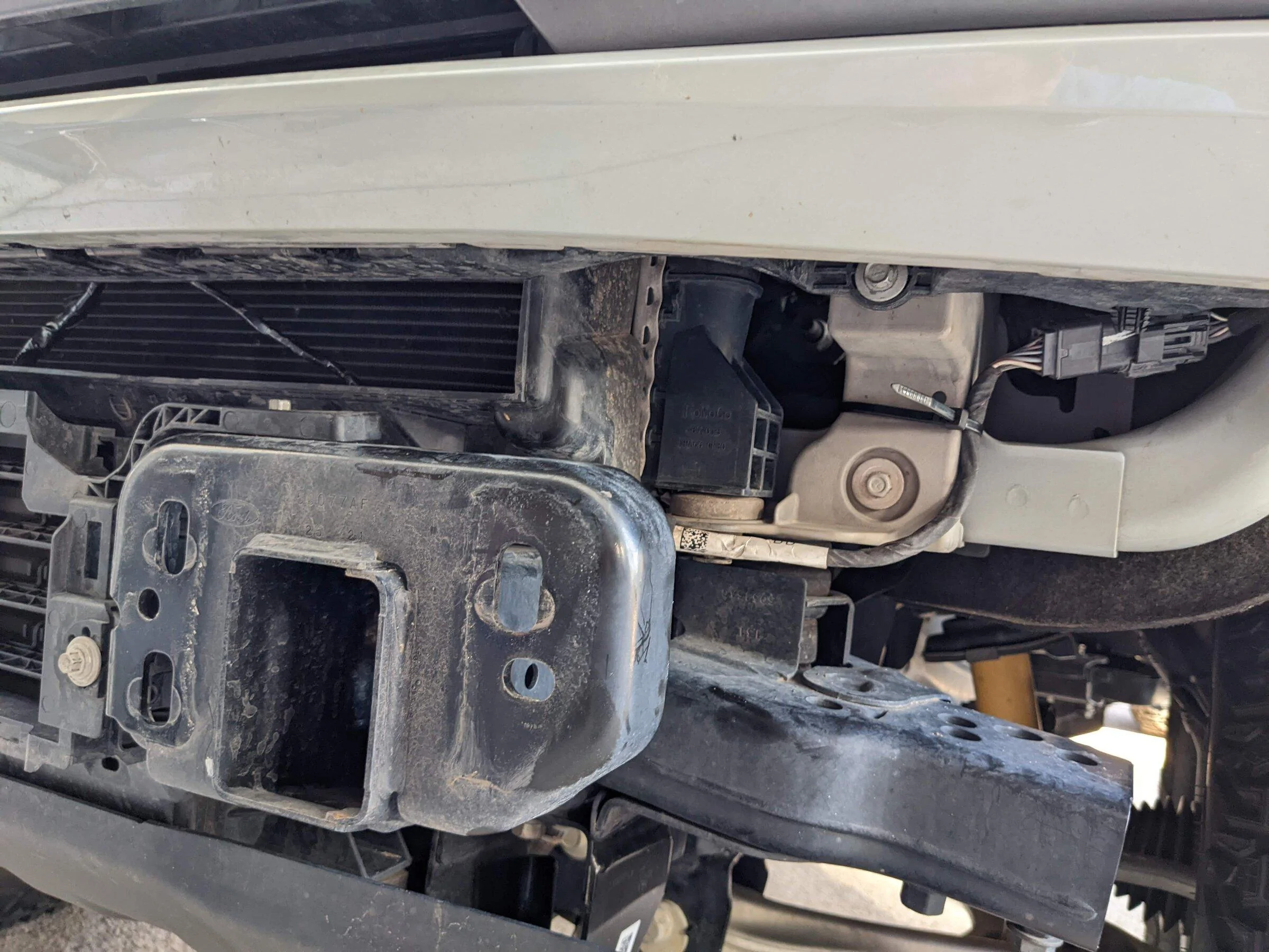 Ford Bronco DV8 MTO Front Bumper Installation, ACC Relocation, Parking Sensor Transfer, and Winch Mounting PXL_20220222_220733355
