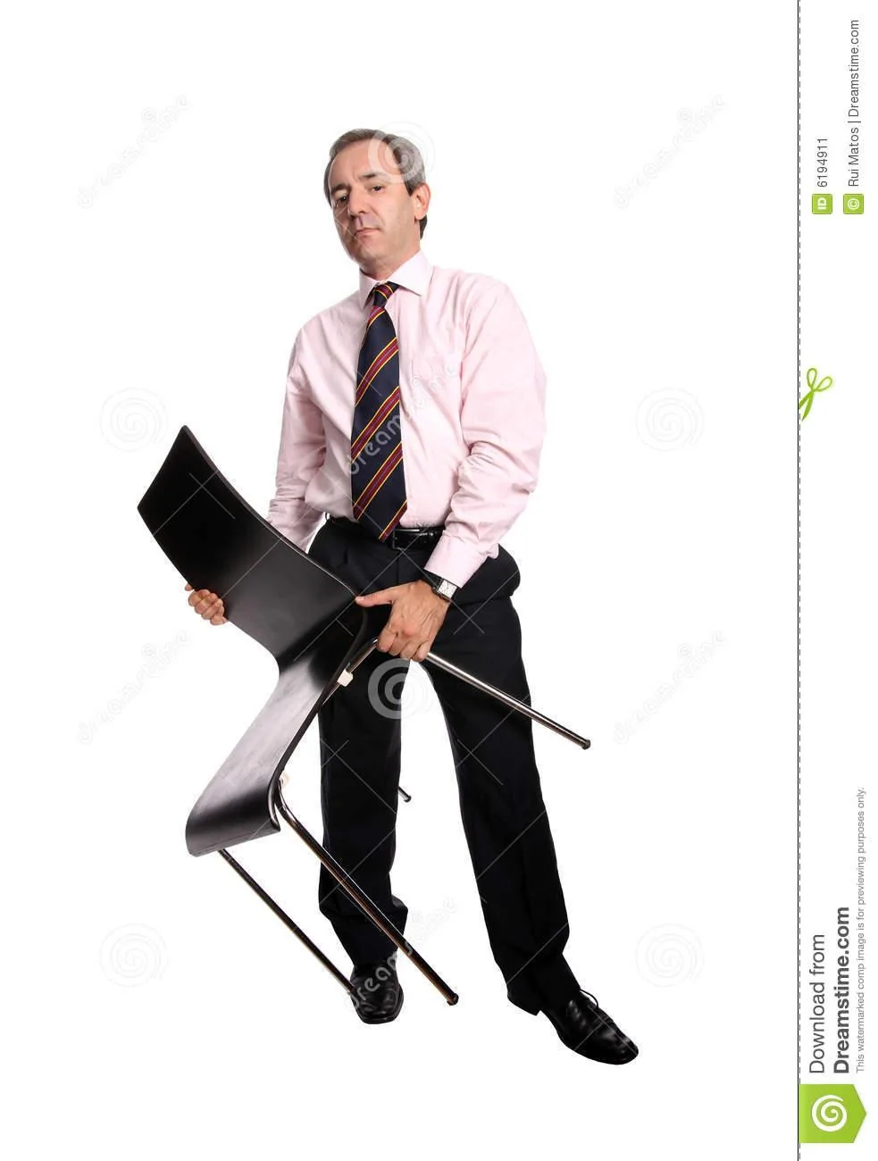 businessman-holding-chair-6194911.jpg