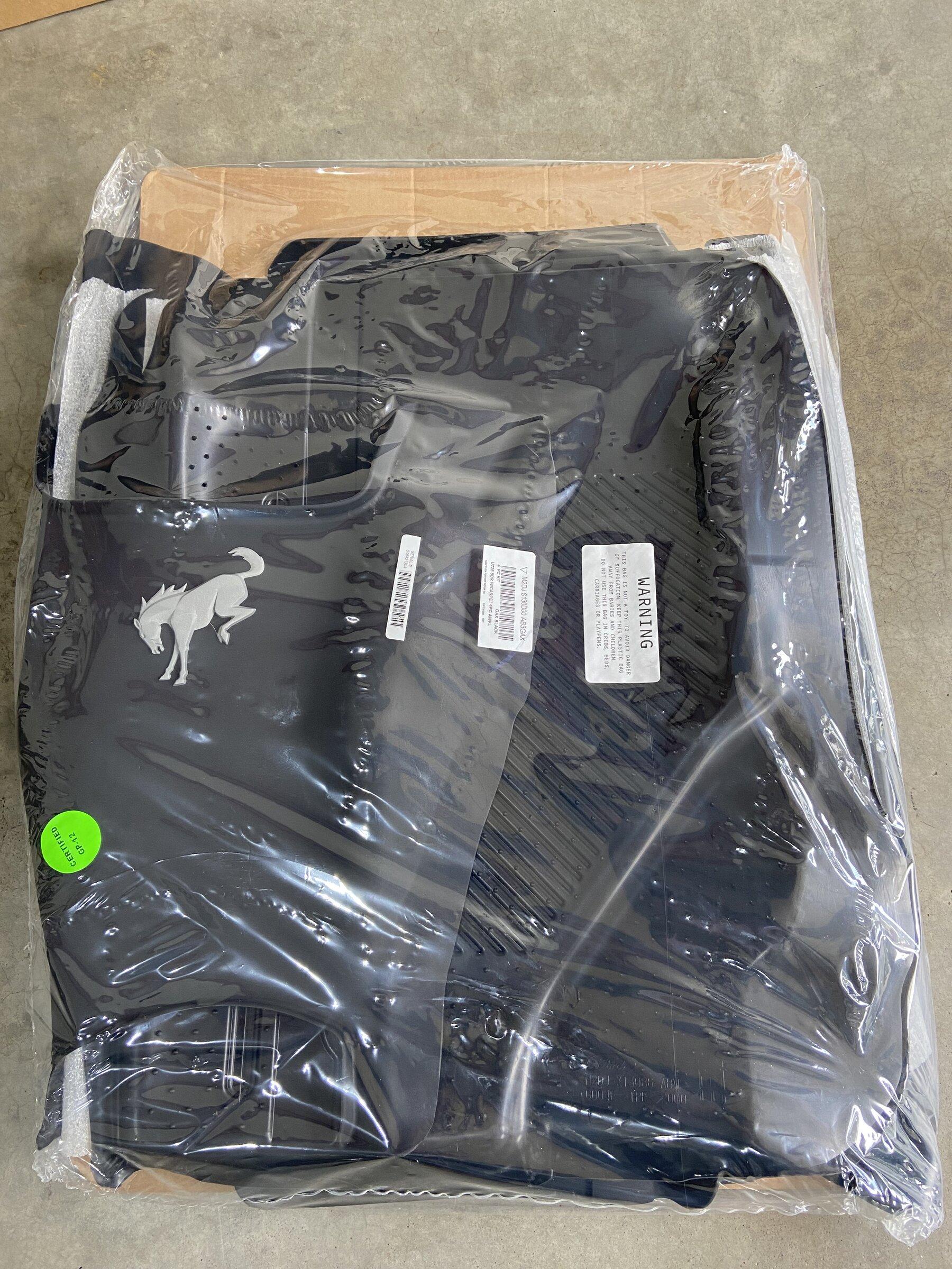 Ford OEM front and rear set weather floor liners.jpg