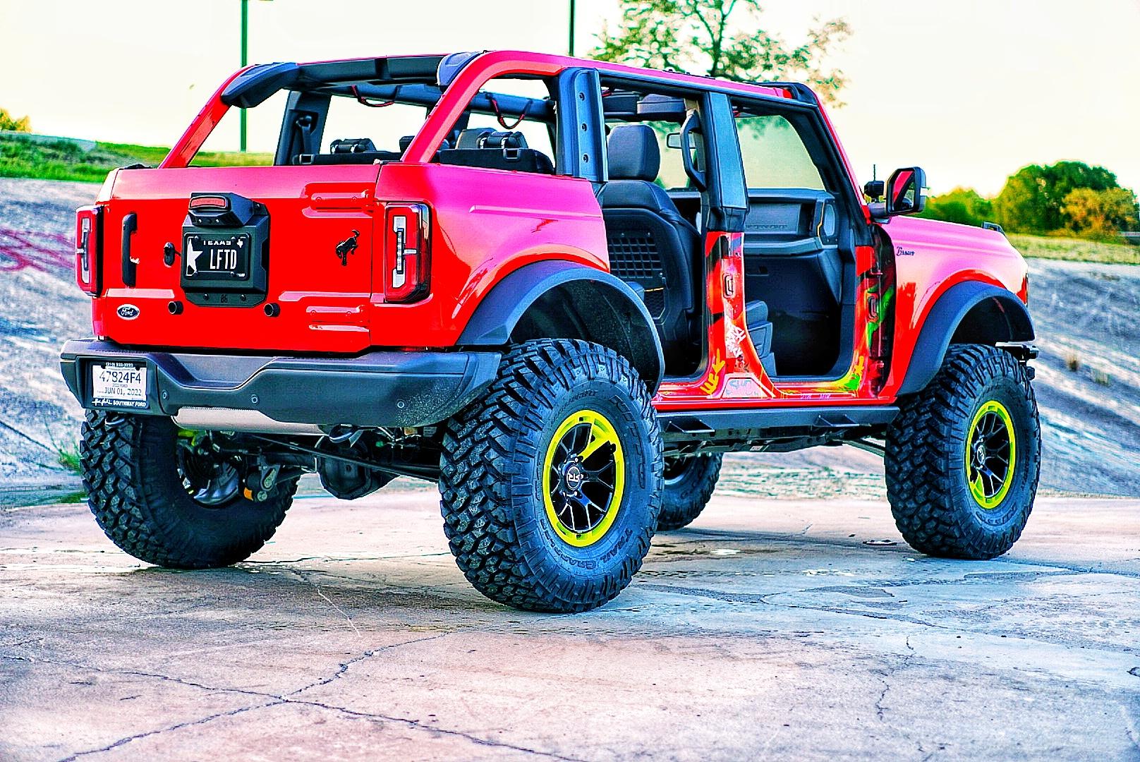 Ford Bronco My Badlands Race Red on 38's, 17" RTR wheels, 4.5" custom lift, custom steps & graffiti DSC00807-01