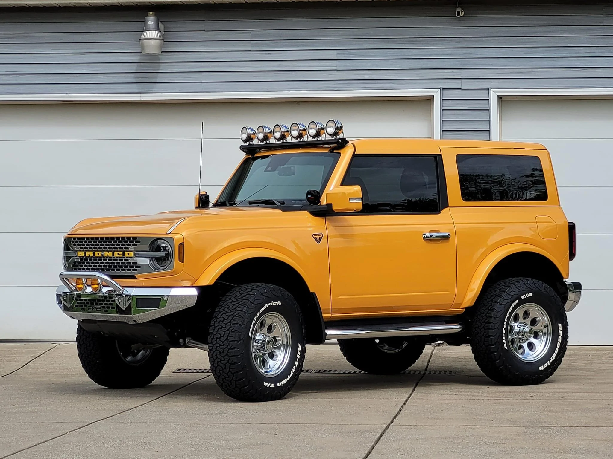 Ford Bronco Retro Cyber Orange Bronco with chrome bumpers 2-door build 284259566_10208723134232785_30791148557179622_n