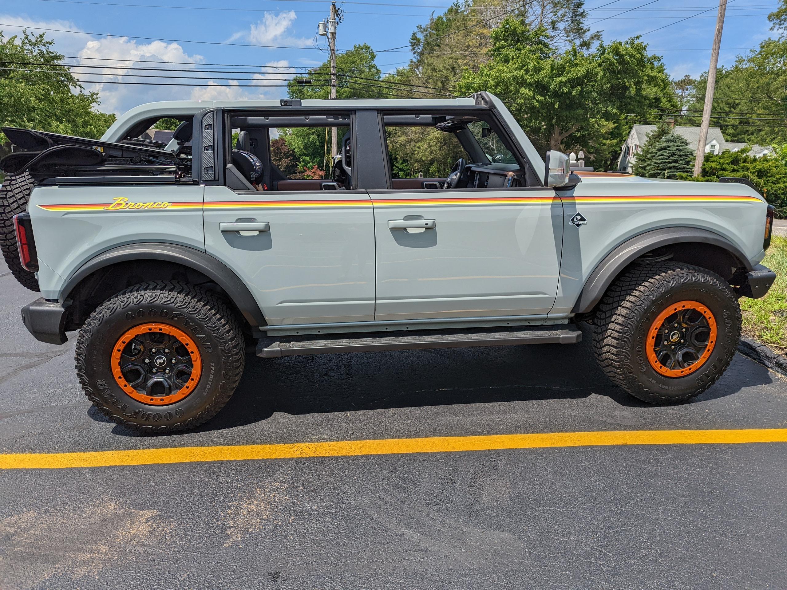 Ford Bronco Mall squatch with retro stripes and orange beauty rings. PXL_20220701_181631403