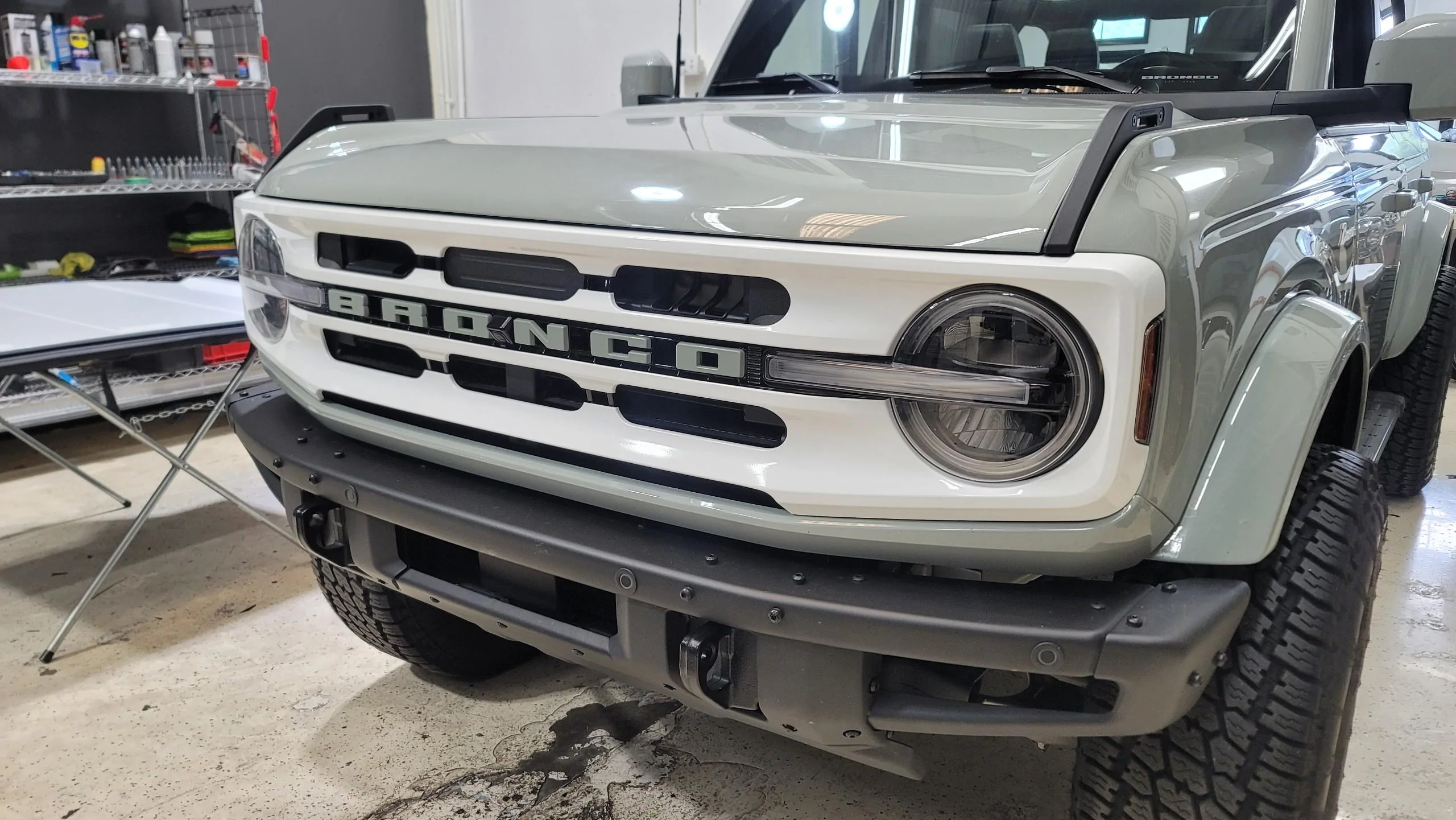 Ford Bronco Retro Build Outerbanks Bronco featuring white roof, grill, stripes 1657557654774