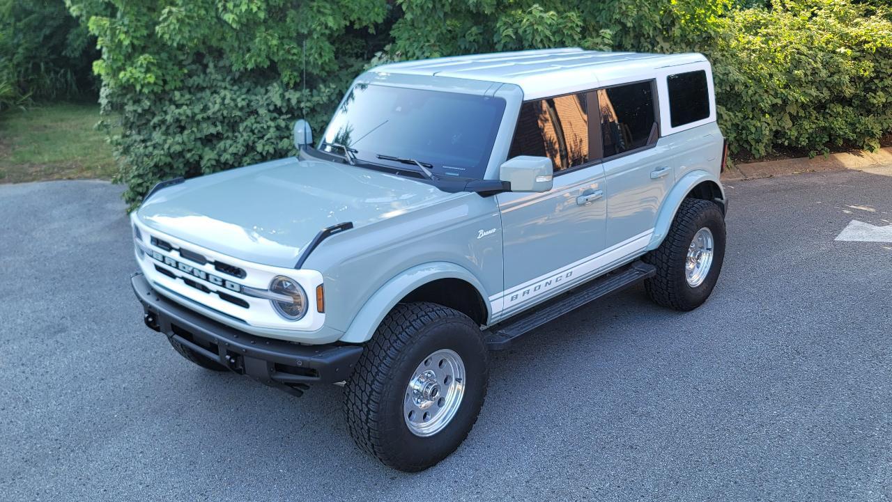 Ford Bronco Retro Build Outerbanks Bronco featuring white roof, grill, stripes 1657557784843