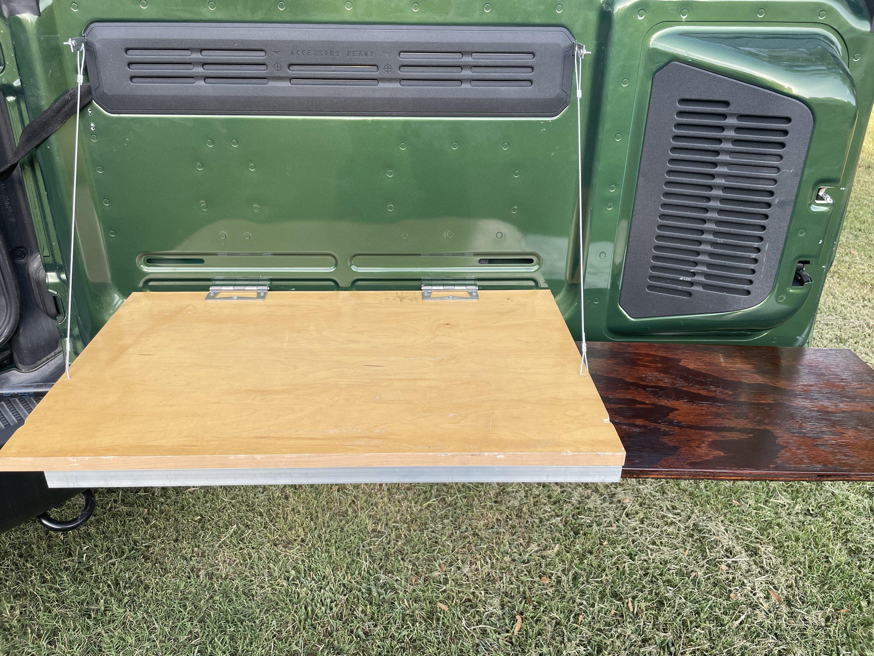 Ford Bronco Cheap and easy DIY rear door table, $25. 7DB2505F-885A-4697-B03B-D9506B991D20