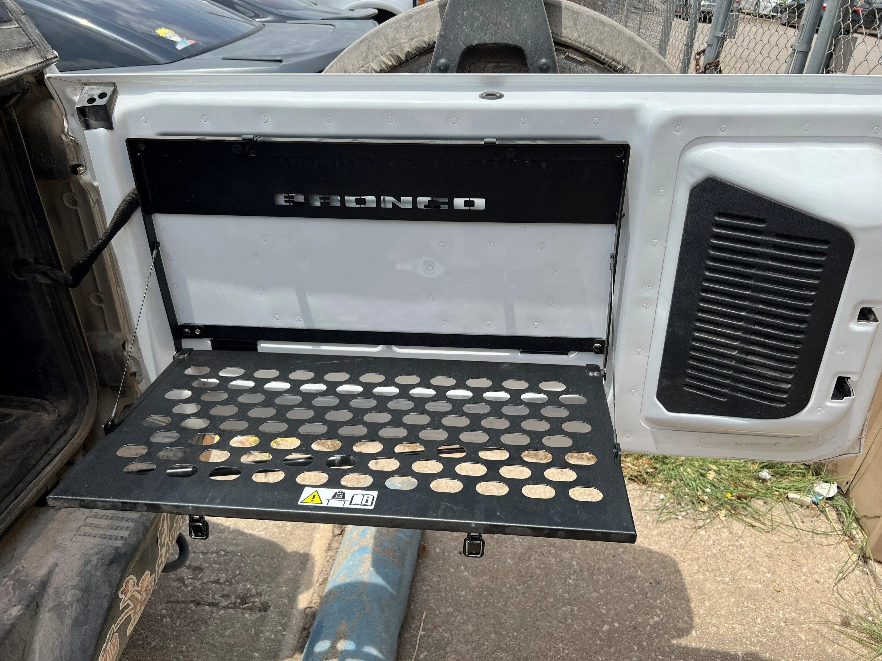 Ford Bronco Cheap and easy DIY rear door table, $25. tabl