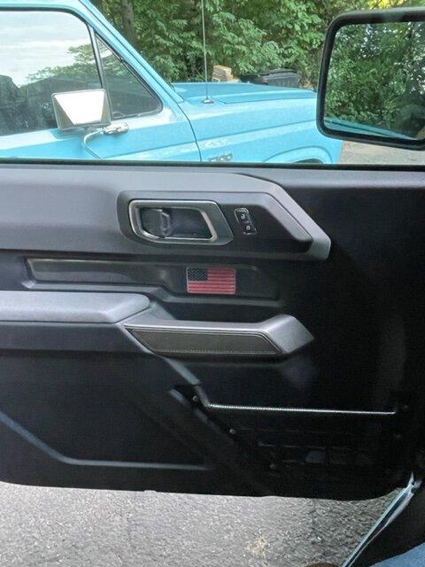 Ford Bronco got some interior door badges (2 door). driver door fla