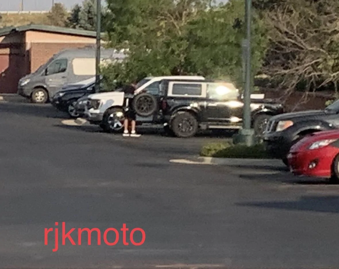 Ford Bronco SPOTTED: 2-door Bronco Outerbanks tester in Denver, next to F-150 2 Door Bronco Outer Banks Next to F-150 image0