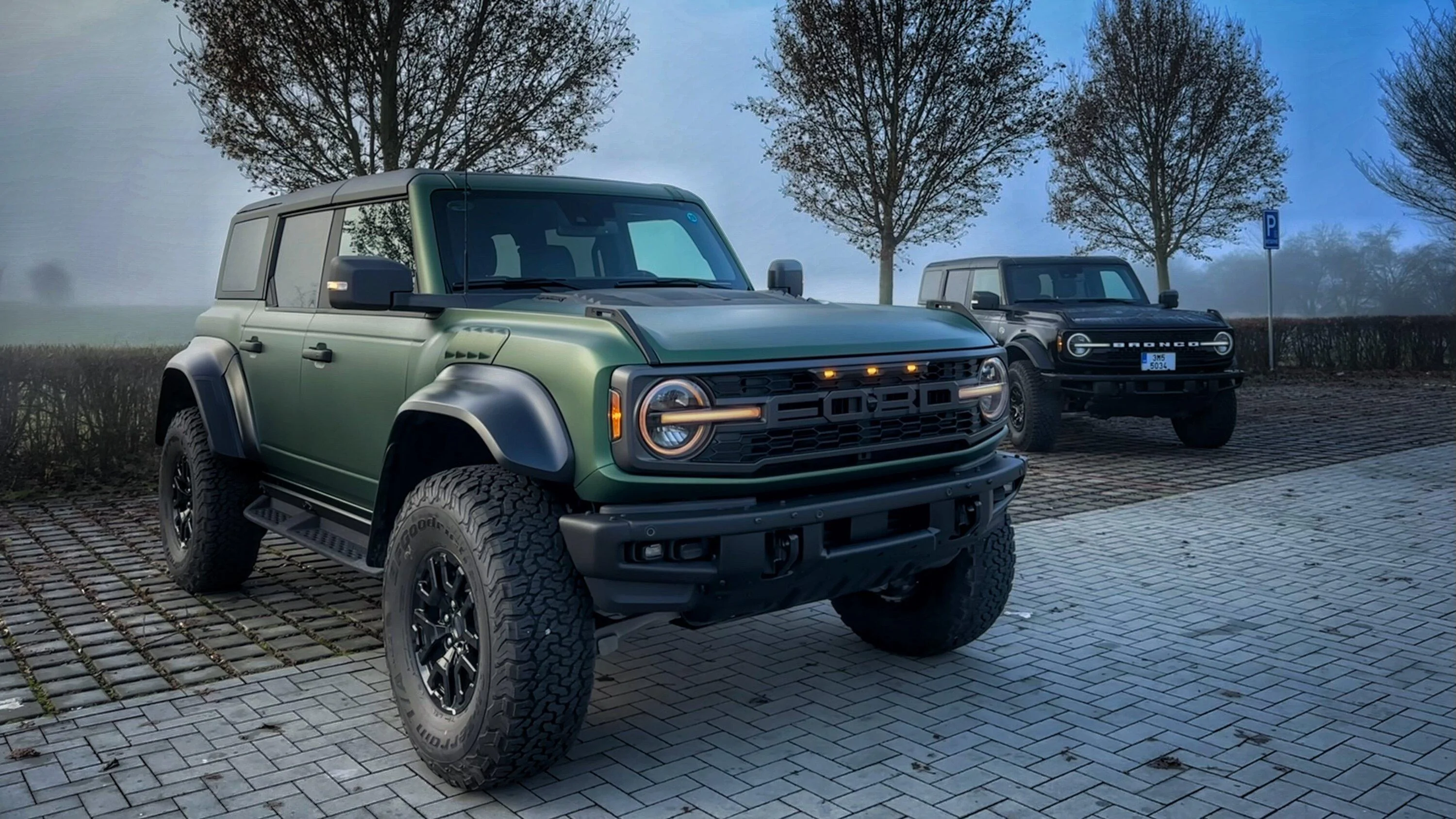 Ford Bronco Eruption Green Bronco Raptor wrapped in satin stealth PPF wrap with black bumper 3A858434-01CA-4ABC-B398-D3E15AB86415