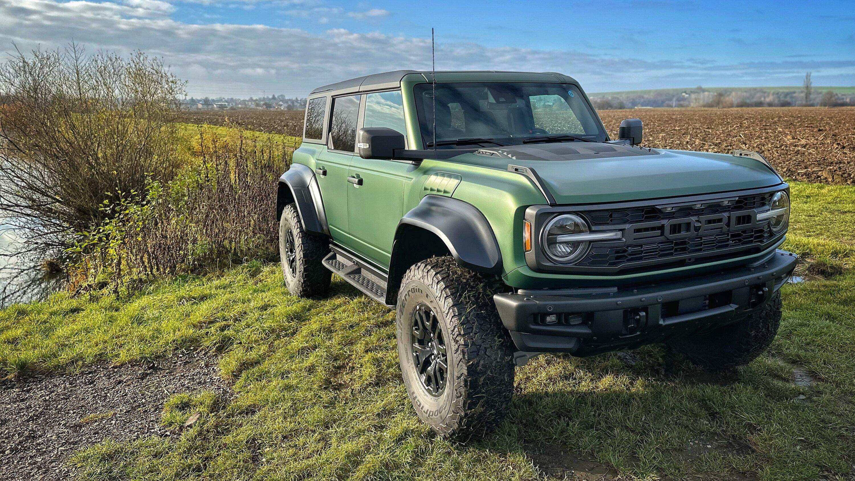 Ford Bronco Eruption Green Bronco Raptor wrapped in satin stealth PPF wrap with black bumper 2A9EF0F5-7AA8-4BB2-9BB7-7E14A33BEA50